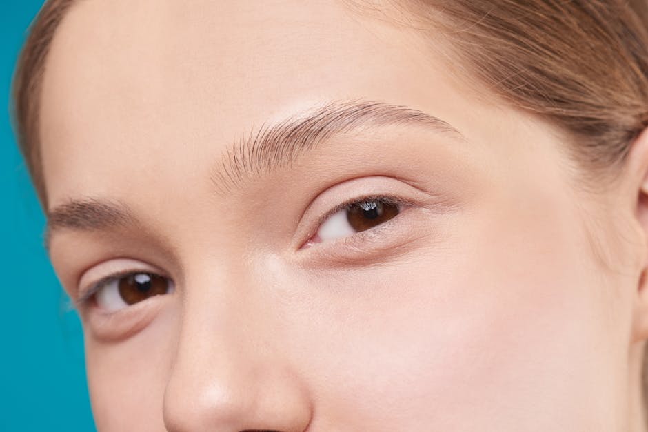 A close-up photo showcasing a woman's natural skin and eye detail, emphasizing natural beauty