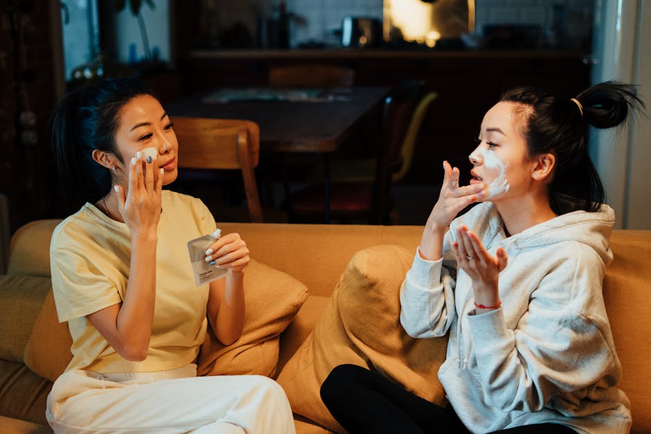 Two friends enjoy a relaxing skincare session at home, enhancing their beauty routines together